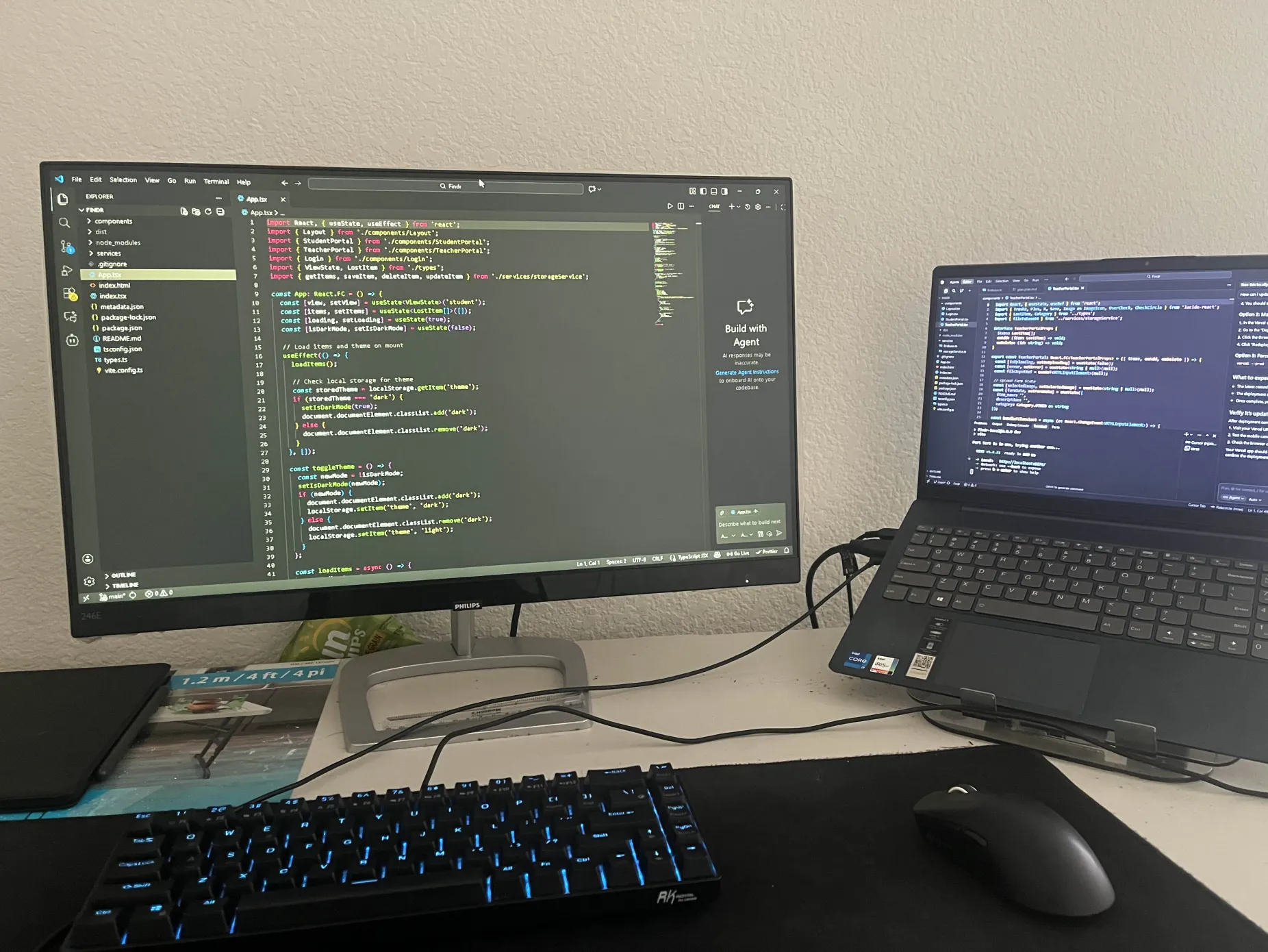 Participant coding at Grizzly Hacks Fall 2025 with dual monitor setup